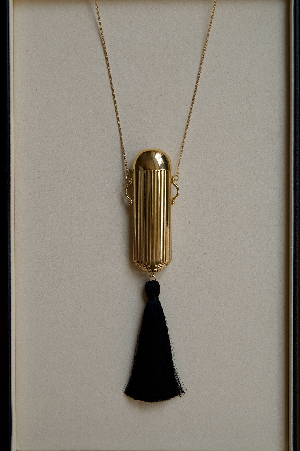 The Pouf Lighter Necklace
