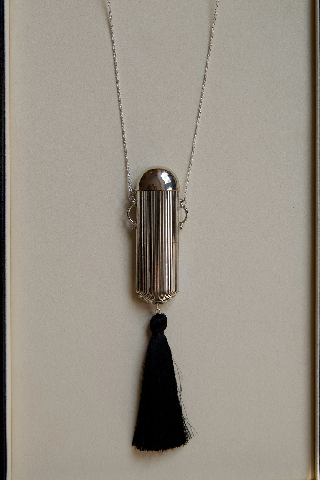 The Pouf Lighter Necklace